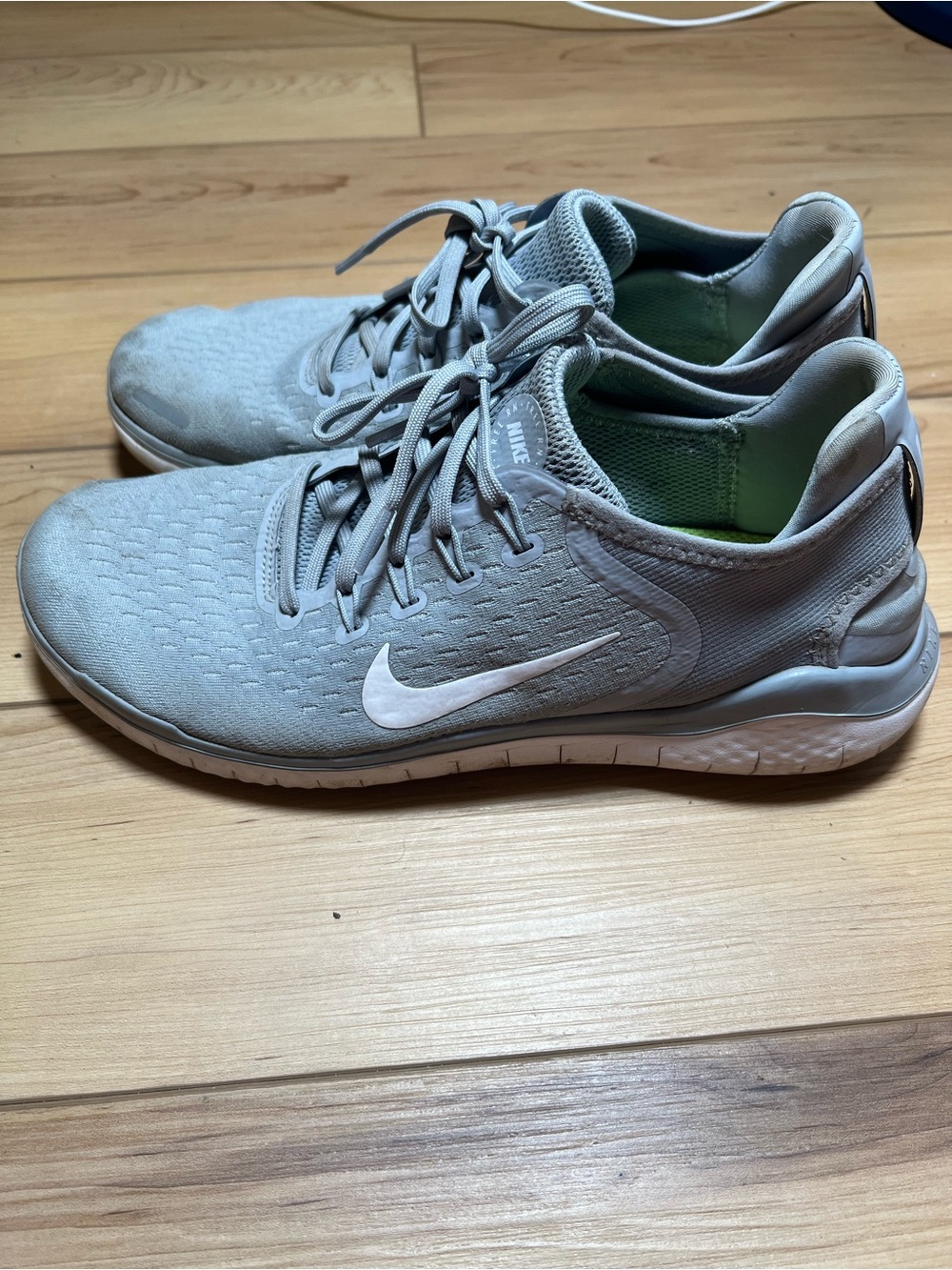 Nike Light Gray Athletic Trainers with White Swoosh